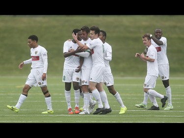 The Foothills FC celebrate scoring at Hellard Field in Calgary on Tuesday, June 2, 2015. The Foothills FC led the Portland Timbers, 1-0, at the first half of regular season Premier Development League play.