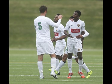 The Foothills FC celebrate scoring at Hellard Field in Calgary on Tuesday, June 2, 2015. The Foothills FC led the Portland Timbers, 1-0, at the first half of regular season Premier Development League play.