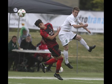 Foothills FC defender Dean Northover, right, jumps higher and stronger, catching the header before his Portland Timbers rival at Hellard Field in Calgary on Tuesday, June 2, 2015. The Foothills FC led the Portland Timbers, 1-0, at the first half of regular season Premier Development League play.