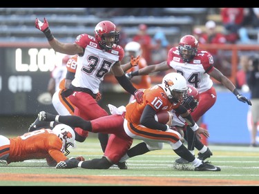 B.C. Lion quarterback Jonathon Jennings is sacked at McMahon Stadium in Calgary on Friday, June 12, 2015. The Calgary Stampeders tied the B.C. Lions, 6-6, at the end of the half in an pre-season exhibition game.