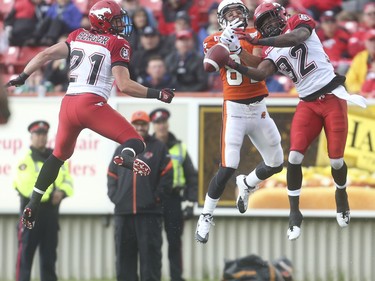 Calgary Stampeder defensive back Tevaughn Campbell jumps to intercept a B.C. Lions pass at McMahon Stadium in Calgary on Friday, June 12, 2015. The Calgary Stampeders tied the B.C. Lions, 6-6, at the end of the half in an pre-season exhibition game.