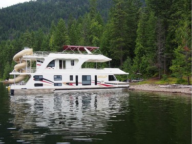 Docking for the evening at Hungry Cove, a popular spot for houseboaters to spend a night on Shuswap Lake.
