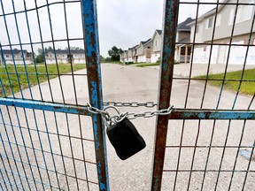 Empty homes in the deserted area of Wallaceville in High River, two years after the water swept through the area in floods of 2013.