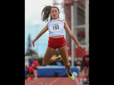 Emma Chong hurls herself into the air while competing in the long jump at the Caltaf Track Classic in Calgary on Saturday, June 20, 2015.