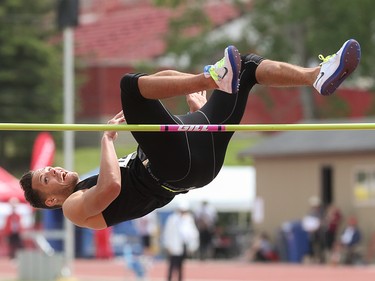 Isaac Tyler competes in the high jump at the Caltaf Track Classic in Calgary on Saturday, June 20, 2015.