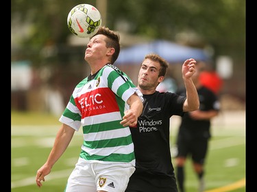Foothills FC striker Dominic Russo, left, heads the ball at Hellard Field in Calgary on Sunday, June 21, 2015.