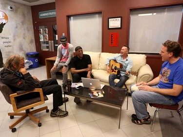 Max Ciesielski, left, Jordan Williams, Mark Sims, Kris Demeanor, and Michael Frisby during a recent rehearsal at the Calgary Drop-in and Rehab Centre for their performance at Sled Island.