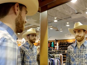 Calgary Herald scribe Dylan Robertson in his new cowboy look for the Calgary Stampede, courtesy of Lammle's.