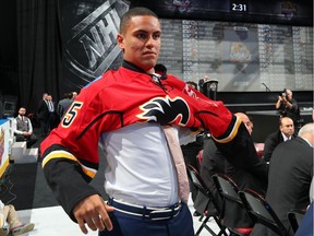 SUNRISE, FL - JUNE 27:  Oliver Kylington reacts after being selected 60th overall by the Calgary Flames during the 2015 NHL Draft at BB&T Center on June 27, 2015 in Sunrise, Florida.