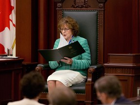 Lois Mitchell delivers the speech from the throne in Edmonton on Monday.