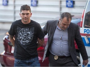 Kevin Rubletz is brought to the Calgary Police Arrest Processing Unit in Calgary on Friday, June 26, 2015. Rubletz was charged with second-degree murder in connection with Jessica Rae Newman's homicide.