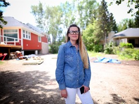 CALGARY.;  June 16, 2015  -- Leah Ramsay stands where her home used to be on the Banks of the Bow River in Bowness after it had to be demolished due to the damage caused by the floods of 2013. Photo Leah Hennel, Calgary Herald  (For City story by Eva Ferguson)