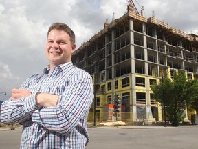 Cameron Rae, development manager for Gablecraft Homes, in front of one of the firm's projects in Bridgeland.