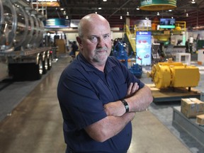 Bruce Carew, VP of Energy for DMG Events, watches over the setup of the Global Petroleum Show at the BMO Centre Monday June 8, 2015.