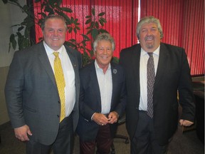 Cal 0627 Italian 5  The 53rd Calgary Italian Sportsmen's Dinner, held June 4 featuring guest of honour and keynote speaker Mario Andretti (centre) was an SRO success and was attended by more than 800 gentlemen. Joining the legendary racing icon are emcees Tony Spoletini (left) and Frank Africa.