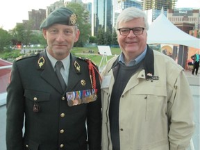 Cal 0704 bridge 4  The second annual Breakfast on the Bridge held  on the Peace Bridge at dawn June 20 raised funds for our beloved military and their families through the Calgary Military Family Resource Centre. This day also marked  the 70th anniversary of the liberation of Holland from German occupation.  Pictured, from left, are guest of honour and keynote speaker this morning Lt. General Mart de Kruif, Commander of the Royal Netherlands Army and event co-founder George Brookman.