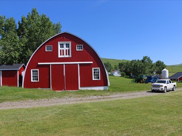 Barns on the Bar-N Ghost Pine Ranch in Southern Alberta are nestled in a protected valley. The 15,000 acre pristine ranch is listed for sale for $42.5 million US.