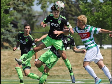 The Seattle Sounders' Florion Valot heads the ball during a match against Calgary Foothills FC at Hellard Field on Sunday June 28, 2015.