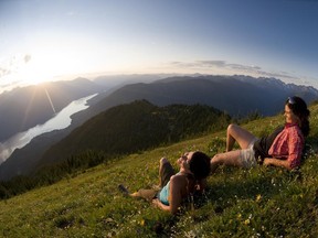 Hikers take in the spectacular views at Idaho Peak.