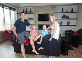 Paul and Regina Harrington are joined by their two children Conor and Emily in their Aspen Rose Estates home.