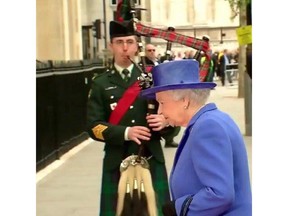 Calgary composer and bagpipe player Kevin Ponte performs for Queen Elizabeth in London, in April, 2015.