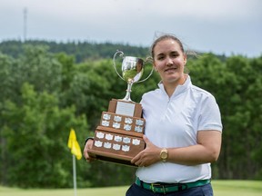 Bearspaw's Meaghan Leblanc displays her trophy after winning the 2014  Calgary Ladies Golf Amateur. She is back to defend her title this week at Cottonwood.