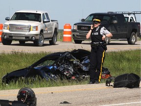The scene of a serious accident at the intersection of Highway 1 and 791 on June 9, 2015, near Chestermere High School. (Colleen De Neve/Calgary Herald)