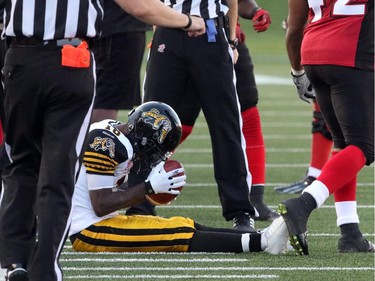 Calgary Stampeders win against the Hamilton Tiger-Cats during their season opener at McMahon Stadium, on June 26, 2015.