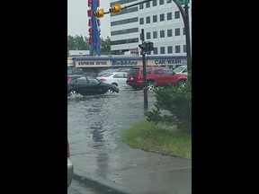 A flooded street captured in southeast Calgary this afternoon.