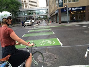 The city of Calgary's Katherine Glowacz showing off the new downtown cycle-track network.