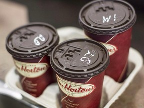 Tim Hortons moved quickly to remove Enbridge Inc. ads from its stores in response to an online petition.
