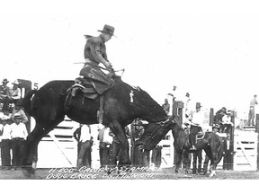 Doug Bruce rides Midnight at the Calgary Stampede. The Alberta born horse threw some of rodeo's best riders.