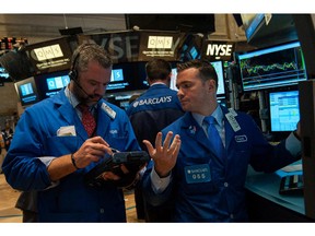 Traders work on the floor of the New York Stock Exchange on June 29, 2015 in New York City. The Dow plunged 300 points as the Greek debt crisis worsened amid fears that Greece will be unable to pay the almost $1.8 billion that it owes the International Monetary Fund on Tuesday.