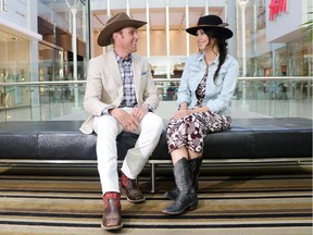 David Cowley and Carly Weasel Child model Stampede fashion for work in the Core on June 18, 2015.  DAVID IS WEARING: Shirt: Brooks Brothers // The Core // $100.00 Pants: Brooks Brothers // The Core // $385.00 Jacket: Brooks Brothers // The Core // $689.00 Accessories: BELT: Brooks Brothers // The Core // $55.00 HAT: Smithbilt Hats inc. // Holt Renfrew //&250.00 + gst POCKET SQUARE: Brooks Brothers // The Core // $38.00  CARLY IS WEARING: Dress: Club Monaco // The Core // $249.00 Jacket: Gap // The Core //$79.95 Accessories: HAT: Smithbilt Hats inc. // Holt Renfrew //&250.00 + gst BELT: Club Monaco // The Core // $119.50 RING: Michael Kors // Holt Renfrew // $150.00