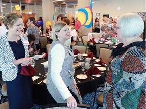 Guests arrive for the launch of  a new initiative called 1000 Women Rising at Bow Valley College on Wednesday morning, June 10, 2015. The initiative's goal is to help women from underprivileged backgrounds get an education.