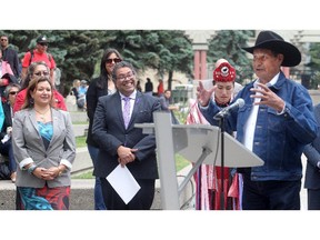 Blood Tribe elder Pete Standing Alone speaks to the crowd during the opening ceremonies of Aboriginal Awareness Week at Olympic Plaza Monday June 15.