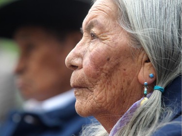 Tsuu T'ina elder Victoria Crowchild, daughter of Chief Gordon Crowhchild, listens during the opening ceremonies of Aboriginal Awareness Week at Olympic Plaza Monday June 15, 2015. This year's theme is Keeping the Circle Strong, Honouring our Veterans and Elders. Saturday is the Family Day Festival Pow Wow at the Calgary Stampede Indian Village.