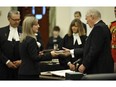 Stephanie McLean is sworn-in as a new member of the Legislative Assembly during a ceremony in the Alberta Legislature, on June 1, 2015.