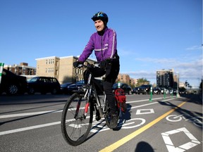 Bill Cozens uses the new cycle tracks on his morning commute to work in Calgary on June 4, 2015.