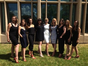 From left to right: Rebecca Poitras, Stephane Martens, Melanna Mamo, Janelle McLeod, Tiffany Harrison, Tina Henry, Elizabeth Finn and Kim Little, show off their red shoes, a midwifery graduation tradition that started at McMaster University.
The eight women, who crossed the convocation stage Thursday, June 4, 2015 at Mount Royal University are Alberta's first midwifery graduates. Robyn Cowie, right, graduates from the program at a later date.