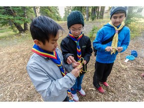 couts learning to tie knots at the soon-to-be closed Camp Gardner, near Bragg Creek.