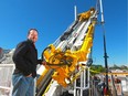 Wes Scott, executive vice-president with dmg:: events, organizers of the upcoming Global Petroleum Show, stands next to a slant drilling rig which will be on display during the show.
