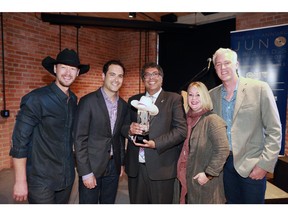 From left, Paul Brandt, Marco DeIaco, VP of Sales, Sports and Major Events with Tourism Calgary, Mayor Naheed Nenshi, Jann Arden and Allan Reid President and CEO with CARAS, the Juno Awards pose with the host city Juno Award presented to Calgary. The mayor had fun white hatting the award earlier with a mini white stetson. Calgary Hosts the Juno Awards in 2016.