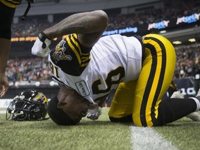 Hamilton Tiger-Cats' kick returner Brandon Banks reacts after his touchdown was called back because of a penalty in the waning moments of the Grey Cup last fall. He insists he's over the disappointment as he leads the Ticats into Calgary for their CFL season opener on Friday.