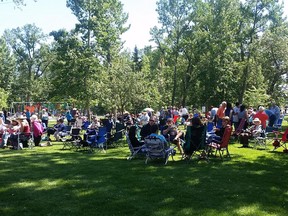 High River residents gathered in George Lane Memorial Park on June 20, 2015 to celebrate two years since the flood that killed two and put many out of their homes. (Emma McIntosh/Calgary Herald)