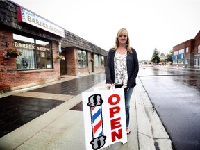 Deanna Green, owner of Pioneer Barber Shop, in High River has gone through many hard times since the floods of 2013 in High River.