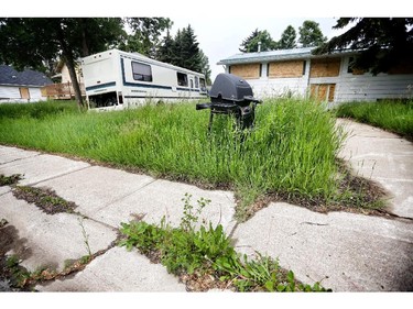 Empty homes in the deserted area of Wallaceville in High River, two years after the water swept through the area in floods of 2013. Photo Leah Hennel, Calgary Herald