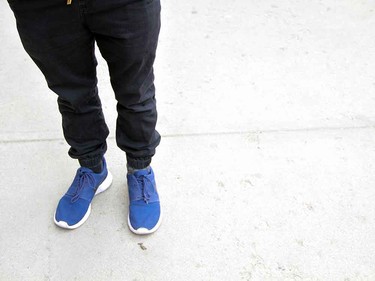 Colourful kicks are the exclamation point at the end of a black ensemble.