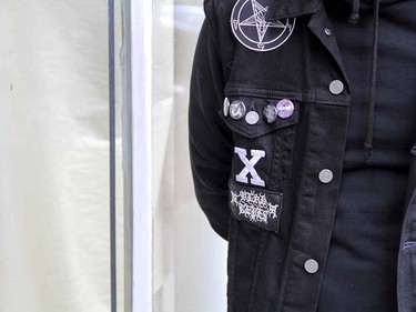 Jay Bones accessorizes with patches and buttons.
