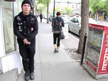 His all-black outfit, to say nothing of the tuque, ignores spring, but still makes a statement.